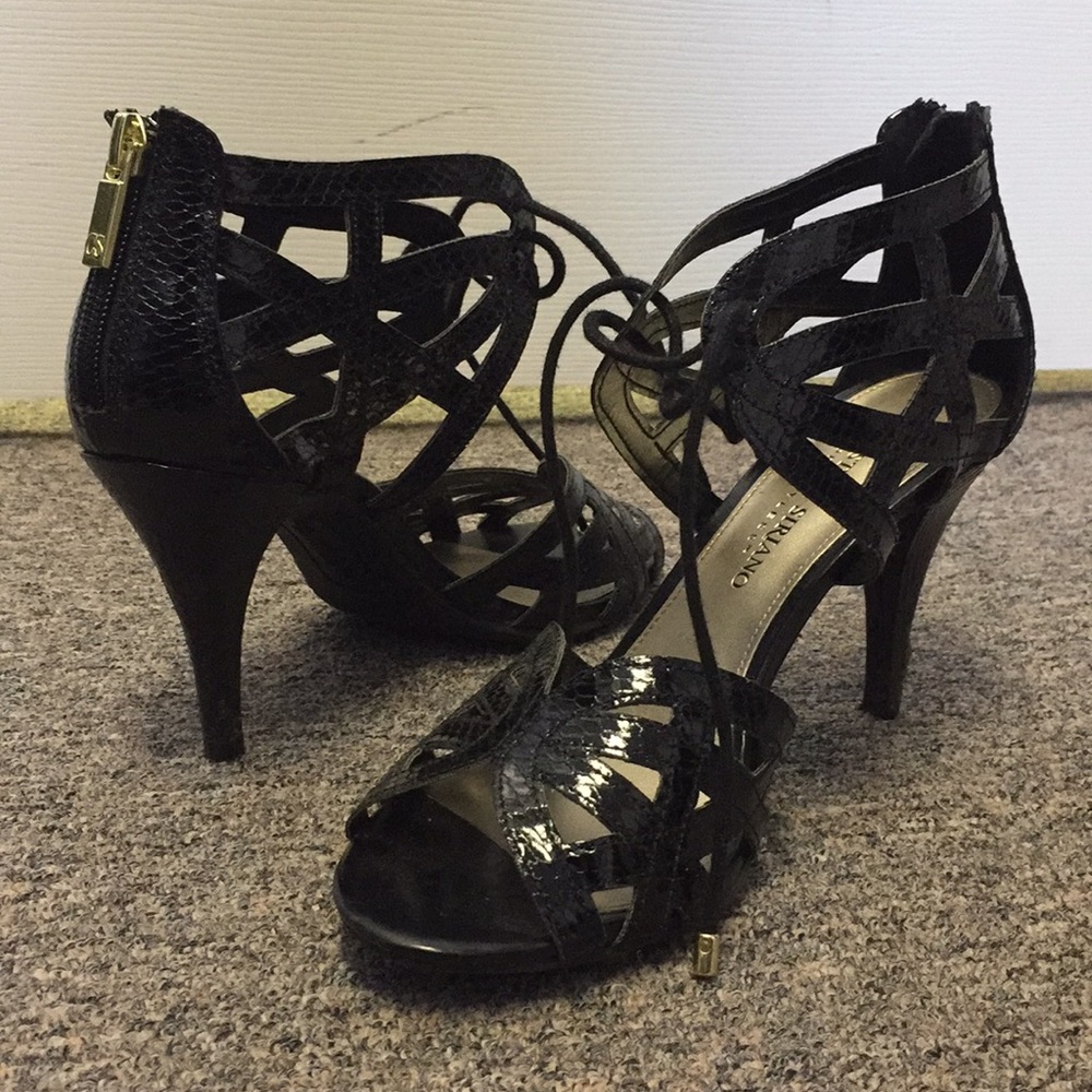 Black, open toe heel. Size 6.5.